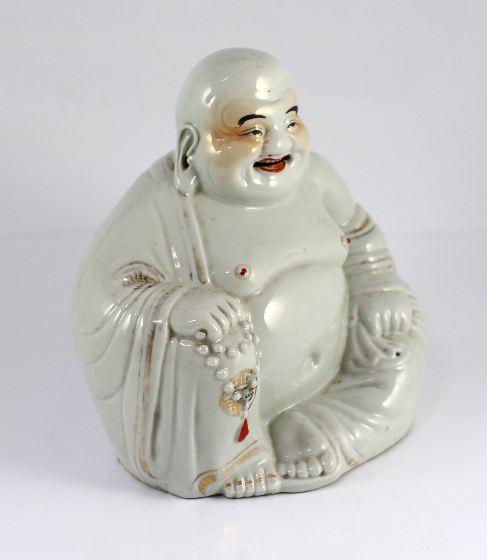 A Chinese porcelain figure of Budai, Republic period, 25cm high, wear to gilding